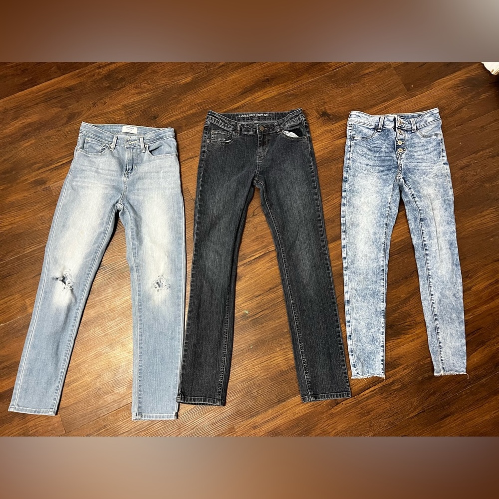 Girls jeans size 12. All like new. From a smoke free home.